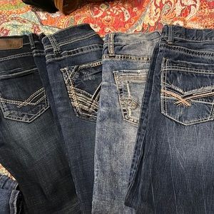 EUC 4 pairs Buckle boys / small men’s jeans.